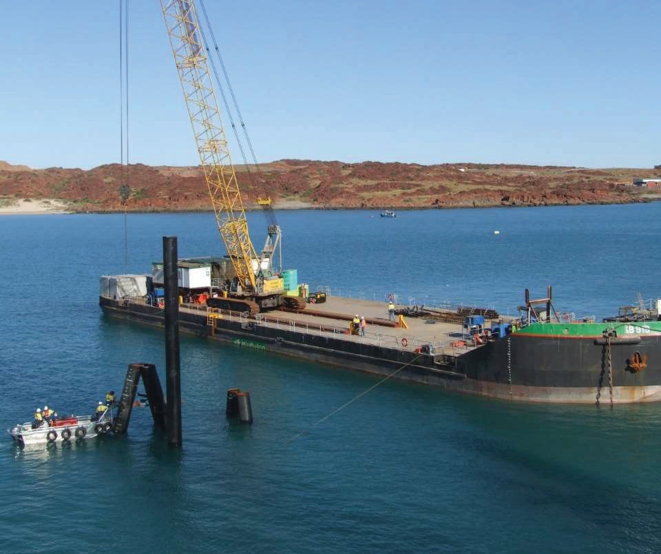 Marine crane lifting operation on barge
